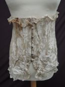 An early 1900s French silk corset with ' Son Altesse, Roi des corsets, Le corset, JTC Paris'