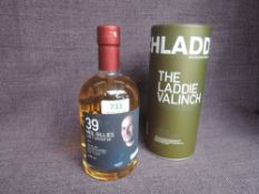 A bottle of Bruichladdich 14 Year old Islay Single Malt Whisky, The Laddie Valinch, limited edition,