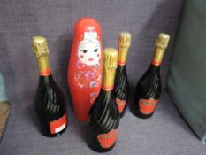 Four bottles of Tsarine Champagne Cuvee Premium Brut all 12% vol and 75cl, one in Russian Doll style