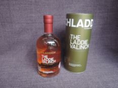 A bottle of Bruichladdich 8 Year old Islay Single Malt Scotch Whisky, The Laddie Valinch, limited