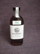 A bottle of Bunnahabhain Islay Single Malt Scotch Whisky, Warehouse 9, cask 3657, 8 year moine