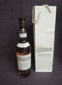 A bottle of Cragganmore Speyside Single Malt Scotch Whisky, Distillery Exclusive Bottling, bearing