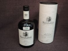 A bottle of Bunnahabhain Islay Single Malt Scotch Whisky, Feis Ile 2017 American Oak 1997, distilled