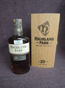 A bottle of Highland Park 25 Year Old Highland Single Malt Scotch Whisky, 45.7% vol, 70cl, in wooden