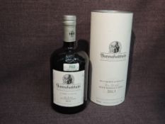 A bottle of Bunnahabhain Islay Single Malt Scotch Whisky, Feis Ile 2021 Moine Bordeaux Finish