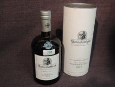 A bottle of Bunnahabhain Islay Single Malt Scotch Whisky, Feis Ile 2021 Moine Bordeaux Finish