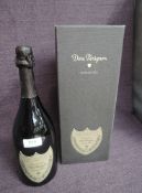 A bottle of Dom Peringnon Champagne Vintage 2004 Brut with leaflet and display box 12.5% vol, 75cl