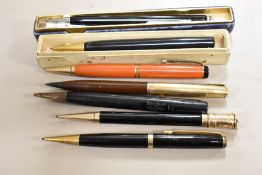Seven propelling pencils, Two Fyne Poynt, Two Parker, a Parker Duofold, an Eversharp and a Waterman