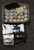 A selection of modern Golf balls and accessories including Dunlop and Slazenger