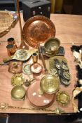 A selection of antique and later metal wares including copper plaque, post horn, horse brasses and