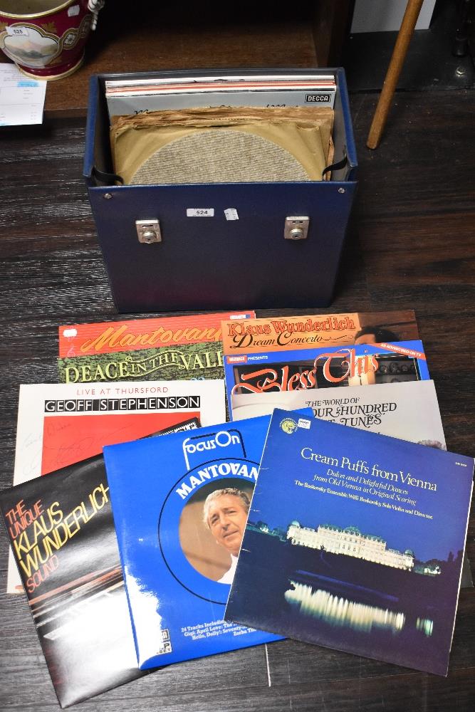 A vintage record box with a selection of vinyl albums including a signed copy of Geoff Stephenson