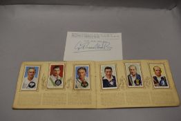 An early 20th century Players cigarette card album of Cricketers with a signed receipt from C.