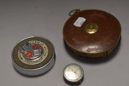 Three 20th century tape measures including a Sterman Sheffield 33ft