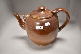 An early 20th century extra large teapot having earthen ware glaze marked made in England