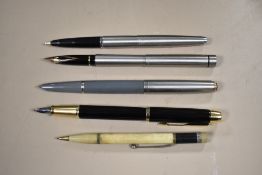 Three Parker fountain pens, a Shaeffer fountain pen and propellig pencil. A Parker 51 vacu fil, A