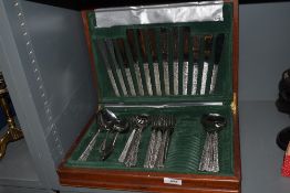 A mid century Viners canteen of cutlery in the bark design. Appears to be missing tea spoons.