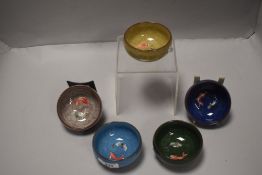 A set of five Chinese bowls with carp fish in base in a harlequin design