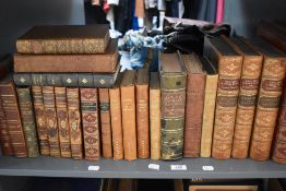 A selection of leather bound library volumes including History of Freemasonry, Fables De La Fontaine
