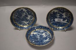 Three antique Caughley ware deep dished saucers with a Chinese temple design. All three in good