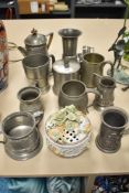 A selection of antique and later pewter wares including Castle tea set, Homeland container and vase