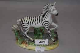 A Staffordshire flat back figure study of a Zebra