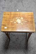 A vintage Sorento style inlayed sewing table with musical top.