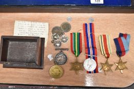 A selection of First World War and Second World War medals including Africa star, Pacific Star and