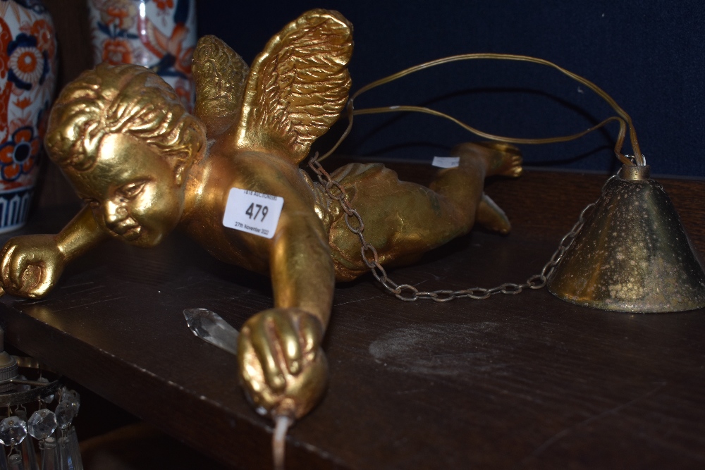 An early 20th century ceiling light in the form of a cherub holding two glass lustre droplet - Image 2 of 3