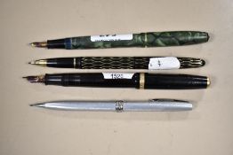 Three fountain pens and a propelling pencil. A lady Sheaffer 11 Skripsert, A Conway Stewart 15 lever