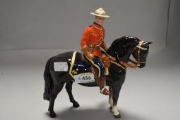 A Beswick study of a Canadian Mountie 1375 having had restoration to head