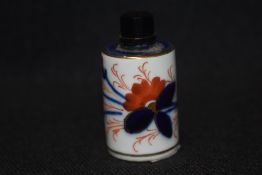 An early 20th century porcelain snuff bottle with hand decorated Imari design