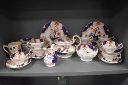 A Victorian part tea service in a Gaudy Welsh pattern