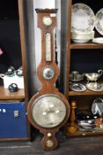 A late Victorian banjo form barometer with convex domed glass, Dial has dropped off.