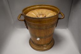 An early 20th century painted tin spittoon bucket with lid.