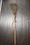 An early 20th century Lacrosse games racket