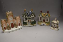 A selection of Staffordshire flatback model houses including pastille burner, money box and spill