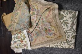 A selection of vintage crewel work throws and similar felted throw.