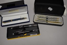 A selection of writing equipment. A Cross fountain pen and ball point pen set in original box