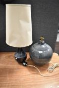 Two lamp bases, One modern in globe form and a vintage 70's West German style