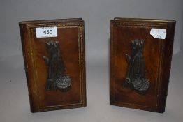 A pair of modern composite book ends in a Game and Fishing design