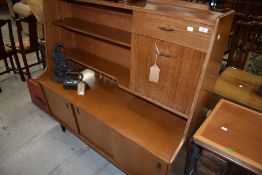 A vintage sapele sideboard unit of stylised design, probably 1960s