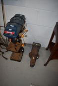 A Ryobi drill press and bench vice