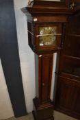 An early 20th Century oak cased Grandmother style long case clock
