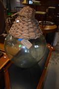 A vintage glass carboy