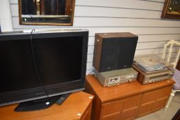 A Panasonic TV and selection of vintage Toshiba hifi components