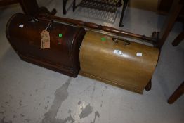 Two vintage sewing machines in dome top cases