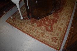 A Belgian style rug, quite faded