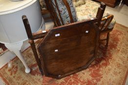 An early 20th Century oak folding tray table 'Revertable'