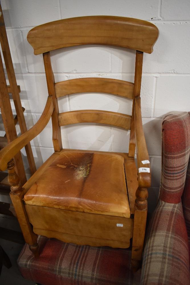 A Victorian satinwood commode