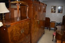 An impressive early 20th Century walnut bedroom suite , 8 pieces comprising wardrobe , tallboy,